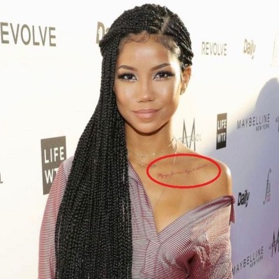 Jhené Aiko made a tattoo of her Miyagi Ayo Hasani Chilombo's name on her left collarbone.